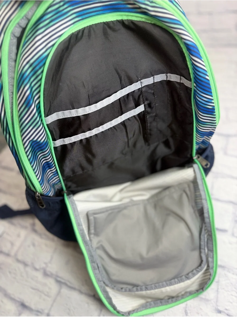 Under Armour Navy Blue Striped Backpack with Lime Accents